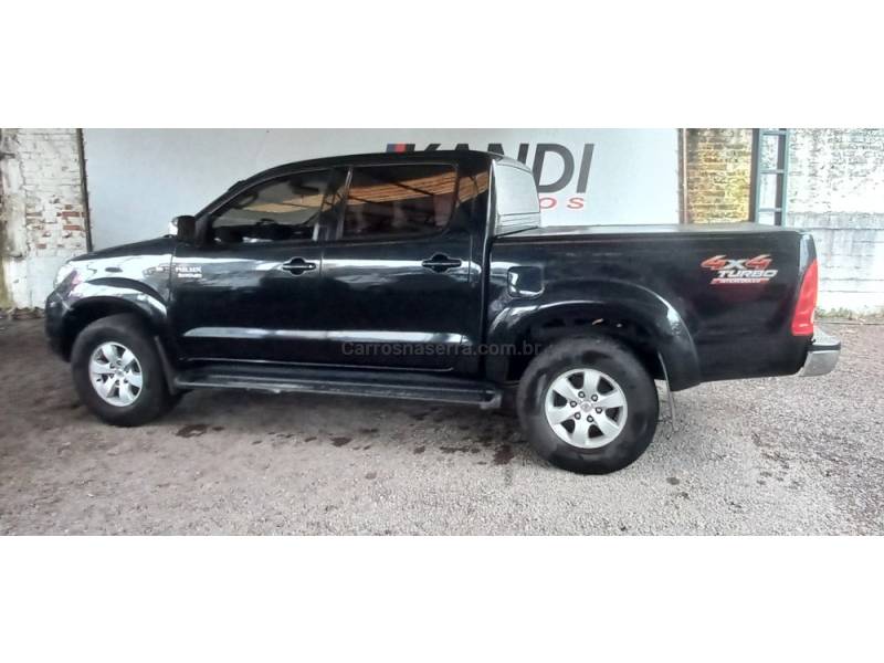 TOYOTA - HILUX - 2010/2011 - Preta - R$ 104.900,00